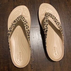 Crocs leopard flip flops